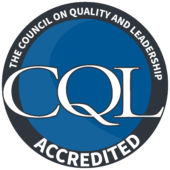 A blue circle with the words cql accredited in it.